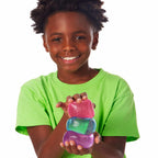 NeeDoh Nice Cube Lifestyle of boy squeezing Nice Cube stack
